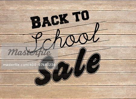 Back to school sale message against wooden surface with planks