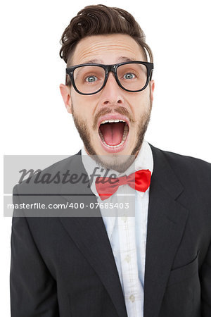 Nerdy businessman shouting with mouth open on white background