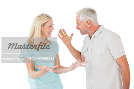 Unhappy couple having an argument  on white background