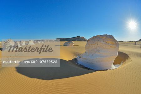 Sun over Rock Formations in White Desert, Libyan Desert, Sahara Desert, New Valley Governorate, Egypt