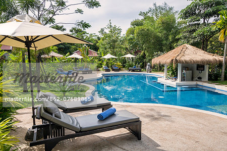 Cambodia, Siem Reap, Siem Reap Province. The swimming pool at Sojourn Villa, a small boutique hotel on the outskirts of Siem Reap.