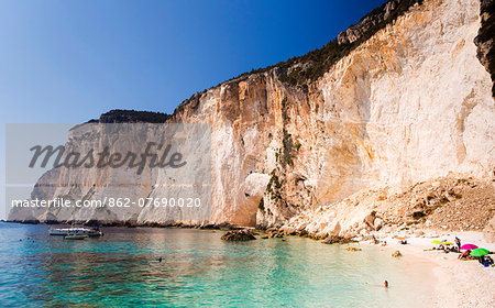 Western Europe, Greece, Ionian Islands, Paxos. Tourists on Erimitis Beach.