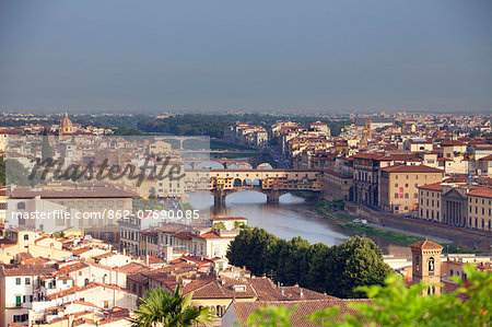 Italy, Tuscany, Florence. Overview of cityscape with the Ponte Vecchio on the Arno river visible. UNESCO.