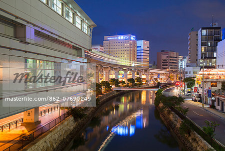 Asahibashi monorail station and downtown Naha at dusk, Okinawa, Japan