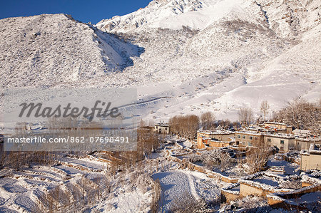 Nepal, Mustang, Samar. The first snowfall of winter covers the small village of Samar.