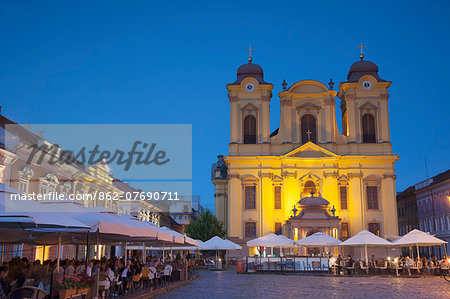 Roman Catholic Cathedral  and outdoor cafes in Piata Unirii, Timisoara, Banat, Romania