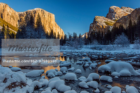 Winter landscape with iced river and El Capitan mountain behind, Yosemite National Park, California, USA