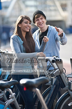Young couple with bicycles
