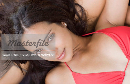 darkhaired woman sunbathing