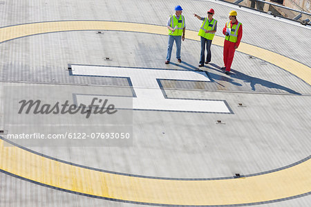 Three workers on helideck