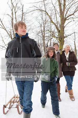 A family walking in the snow