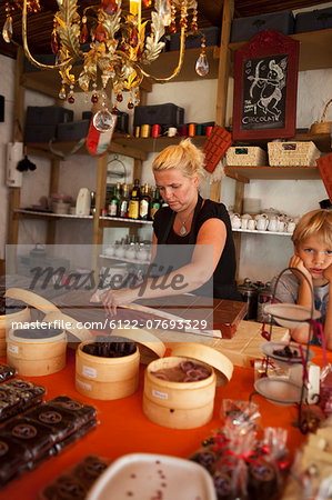 Woman unpacking chocolatebar