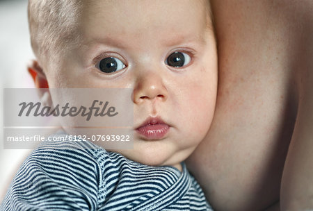 Newborn boy with mum