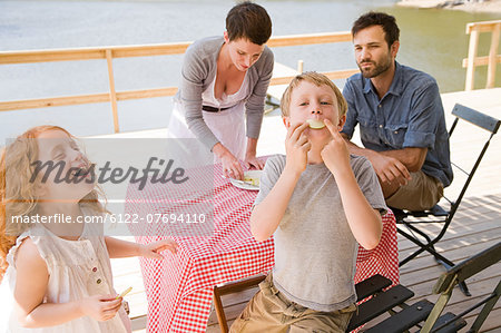 Family enjoying lakeside vacation