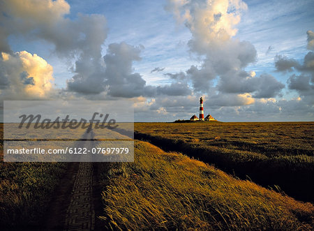 Westerhever lighthouse in marshland, Schleswig-Holstein, Germany