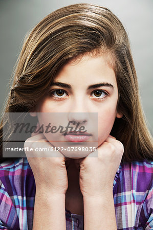 Portrait of young teenage girl, studio shot