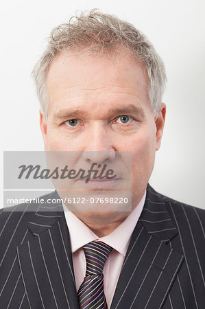 Businessman with serious expression, portrait