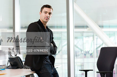 Portrait of young man in IT office