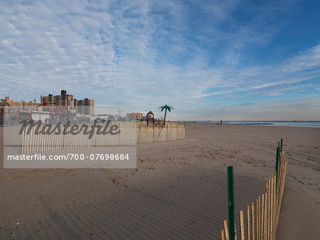 Beach at Coney Island and closed amusement park in winter, New York City, New York, USA