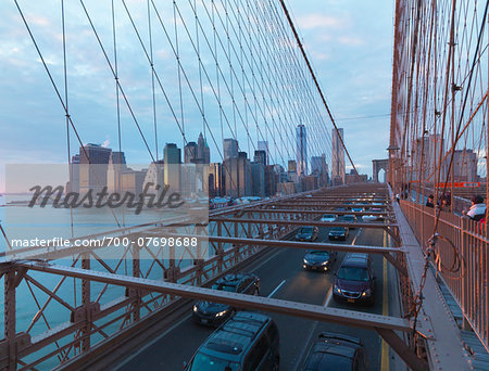 View of Lower Manhattan from Brooklyn Bridge at sunset in winter, New York City, New York, USA View of Lower Manhattan from Brooklyn Bridge at sunset in winter, New York City, New York, USA