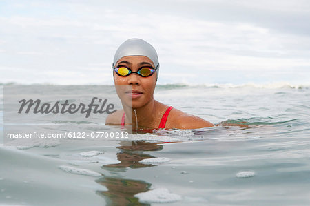 Swimmer wearing goggles in water