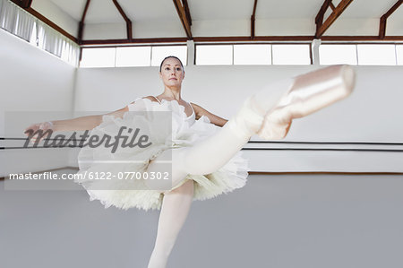 Woman in ballet costume dancing