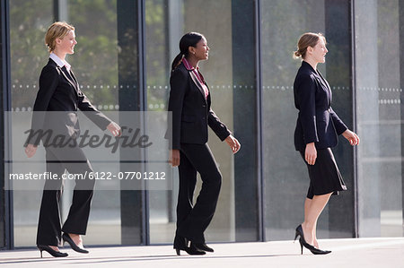 Businesswomen marching in time