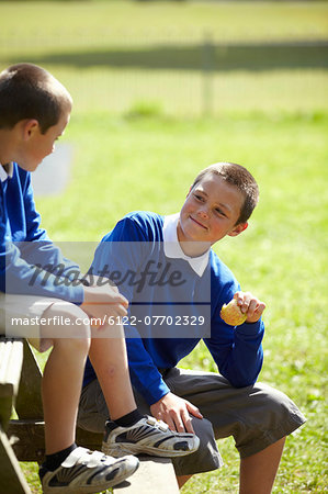 Students eating together outdoors