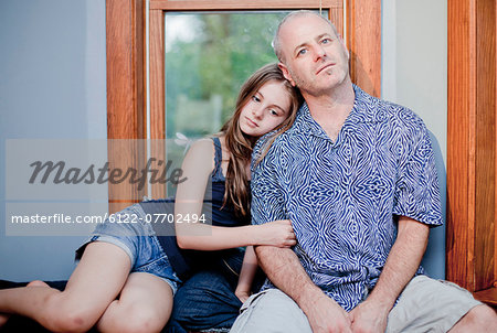 Father and daughter relaxing together