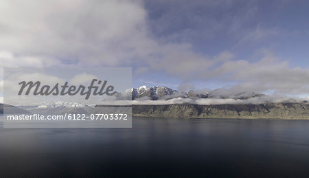 Still lake in rural landscape