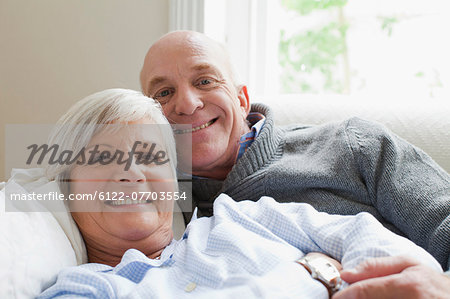 Smiling older couple relaxing together