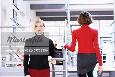 Businesswomen walking in office