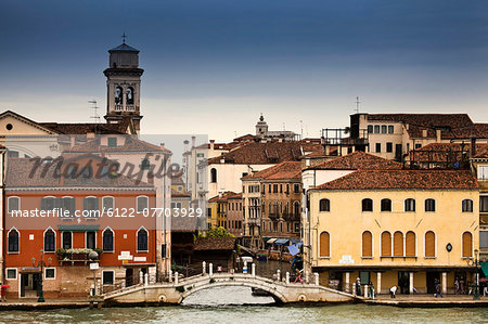 Buildings and bridge on urban canal