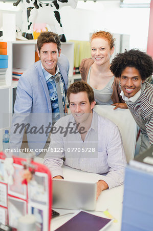 Business people smiling in office Business people smiling in office