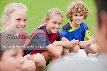 Children laughing during soccer practice