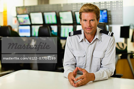 Man working in security control room