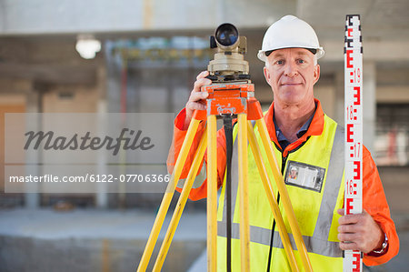 Worker using equipment on site