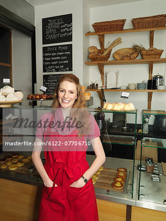 Server in front of bakery counter