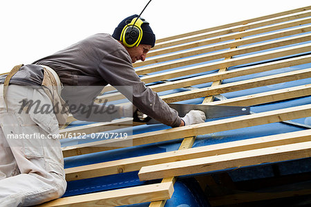 Builder at work on new structure