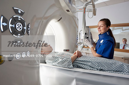 Girl going into CT scanner