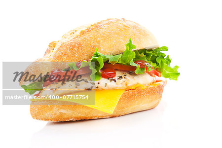 Ciabatta chicken sandwich with fresh salad and cheese isolated on white.