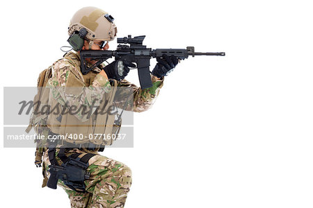 Soldier holding  rifle or sniper and ready to shot