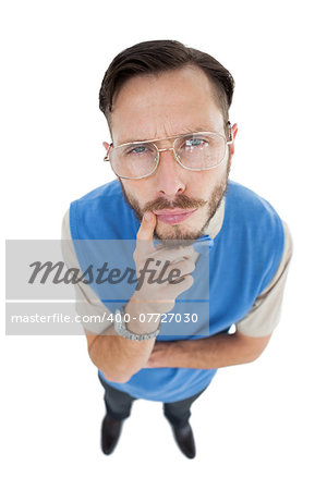 Geeky hipster looking at camera on white background