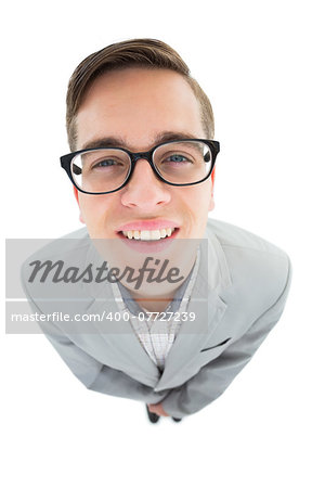 Geeky hipster smiling at camera on white background