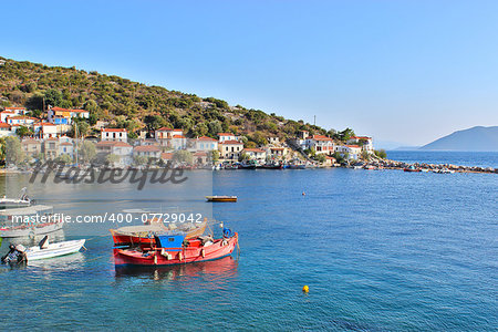 View of the village of Agia Kyriaki at south Pelion, Greece, with the port and fishing boats