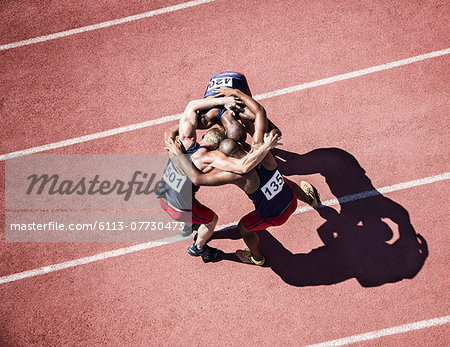 Runners huddled on track