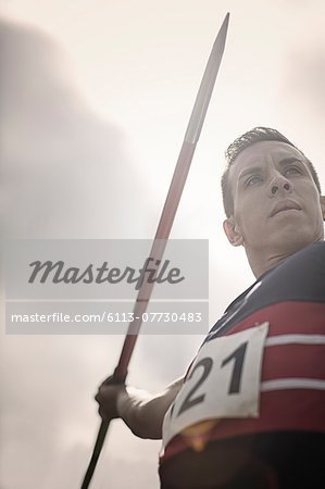 Track and field athlete holding javelin