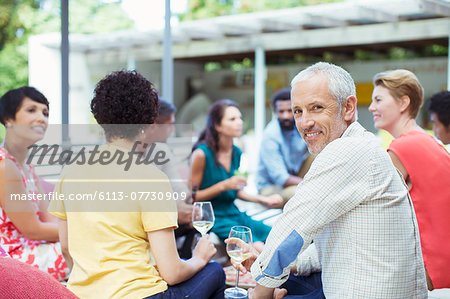 Man smiling at party
