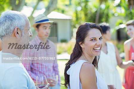 Woman laughing at party