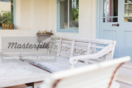 Bench and table in modern backyard